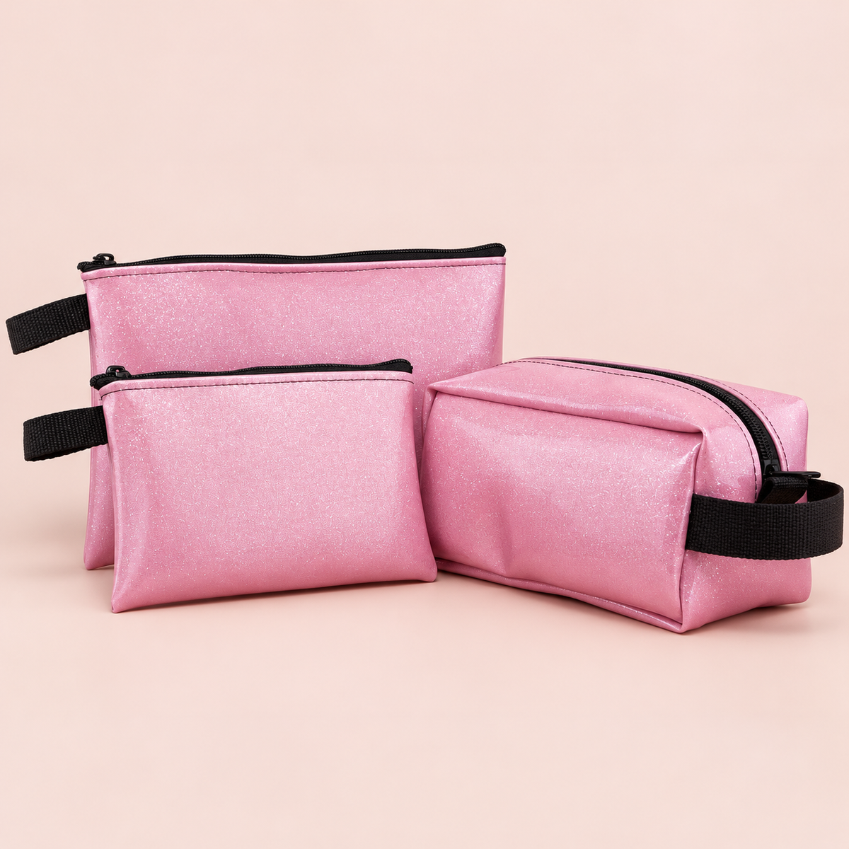 Pink sparkle pouch styles: small, large, and Dopp; sold separately