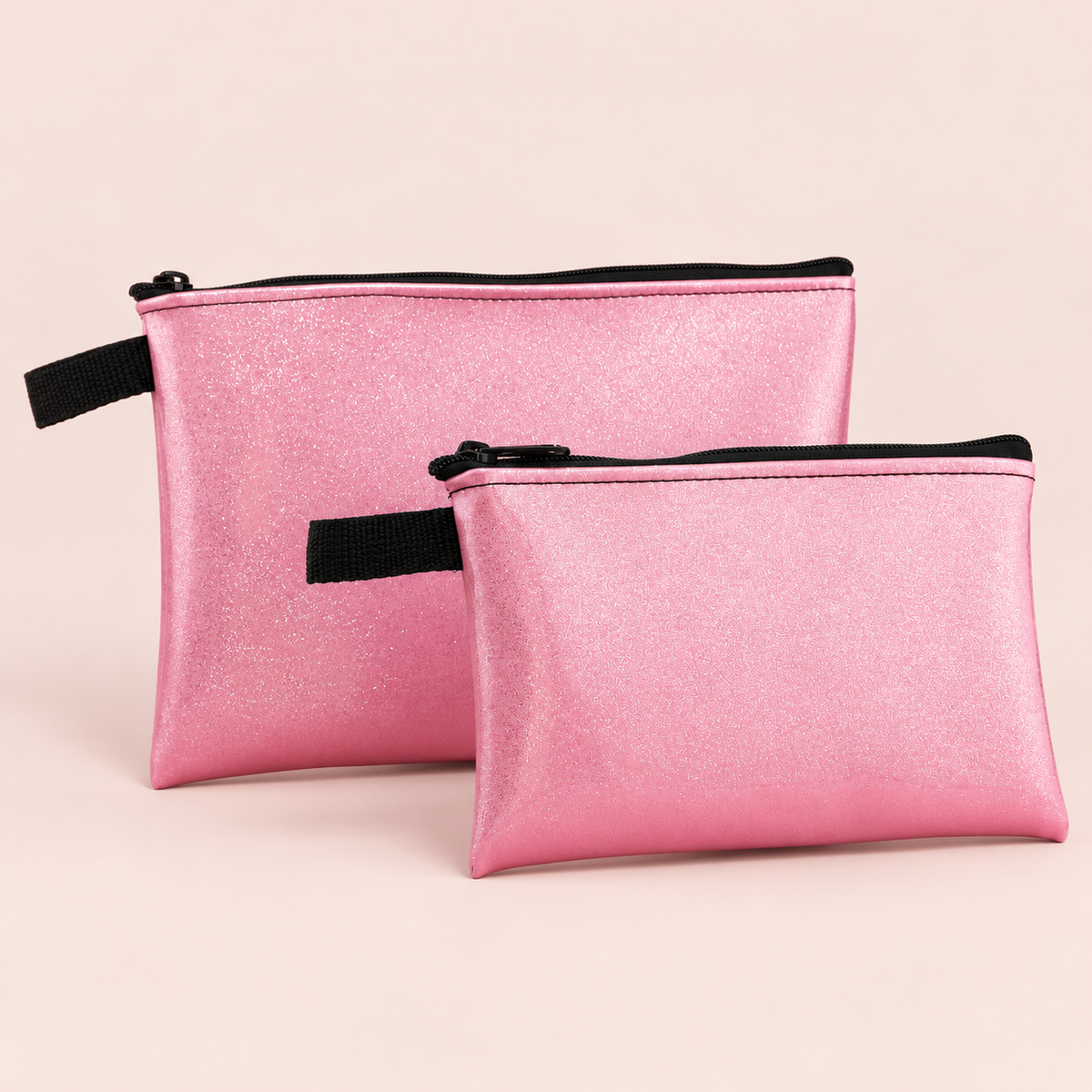 Small and large pink sparkle pouches shown for size comparison; sold separately
