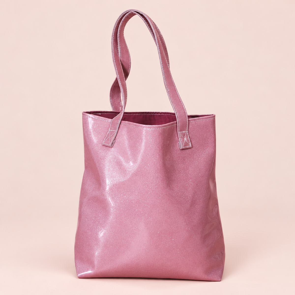 Pink Sparkle Vinyl Tote Bag on a blush studio background