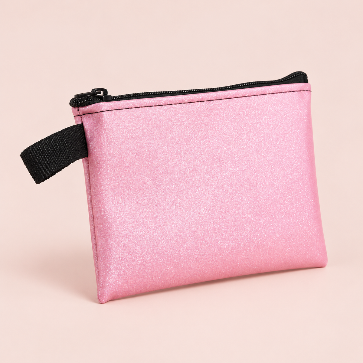 Small Pink Sparkle Pouch on a blush studio background