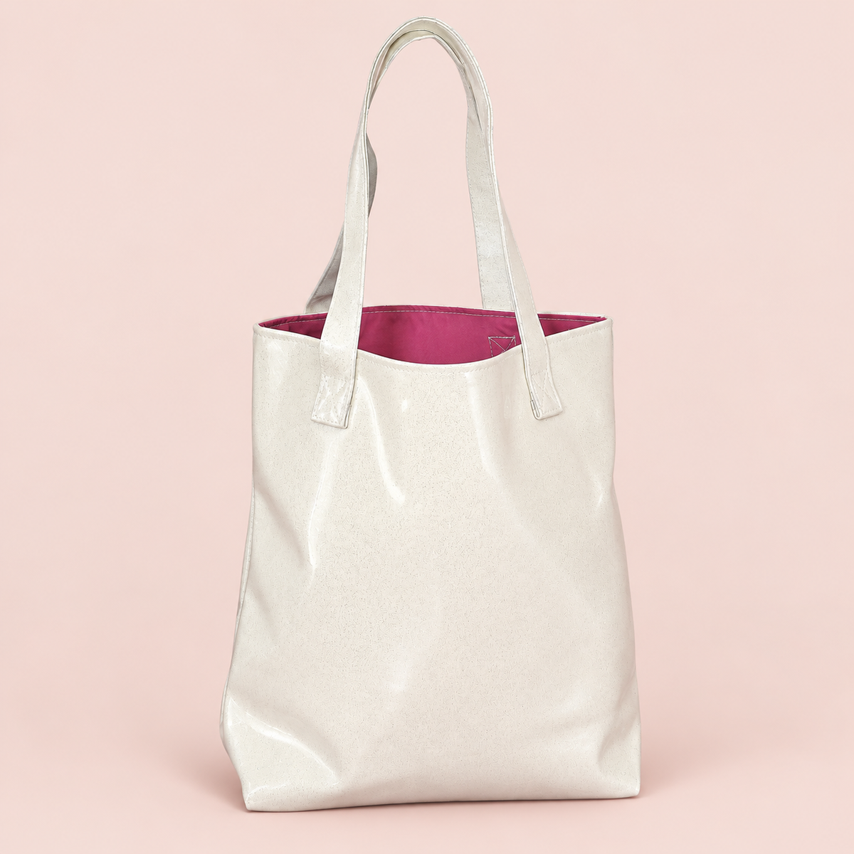 White Sparkle Vinyl Tote Bag on a blush studio background